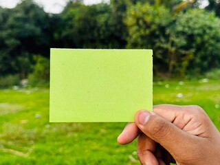 Blank sticky note holding, Hand note for copyspace, empty hand note for news, Blank hand note placeholder