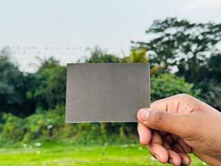 Blank sticky note holding, Hand note for copyspace, empty hand note for news, Blank hand note placeholder