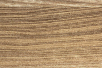 Organic wooden texture background with delicate vertical grain and warm neutral tones.