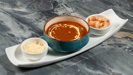 Tomato soup bowl isolated
