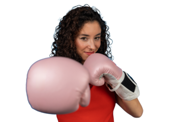 Woman boxer wearing pink gloves on blue background