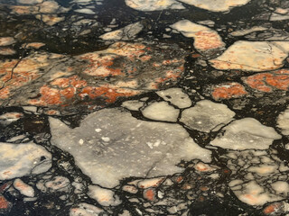 Abstract natural brecciated marble stone surface pattern