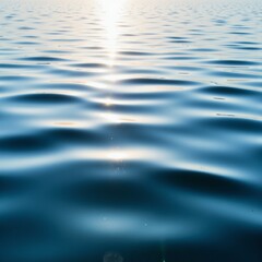 Naklejka premium Serene Ocean Surface with Reflective Waves Glistening Under the Soft Glow of the Setting Sun Creating a Tranquil and Calming Atmosphere