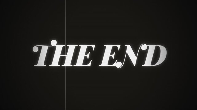 Vintage end text animation on black grainy film background for movie conclusion