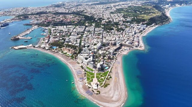 Aerial drone cinematic video of Rodos  or Rhodes island town Elli beach and peninsula a popular summer tourist destination, Dodecanese, Aegean, Greece