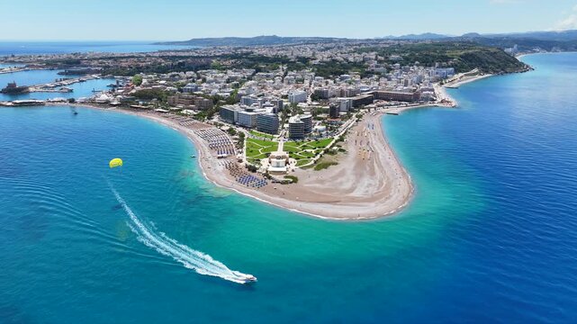 Aerial drone cinematic video of Rodos  or Rhodes island town Elli beach and peninsula a popular summer tourist destination, Dodecanese, Aegean, Greece