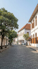 Street architecture of Yogyakarta with classic buildings, empty street, clean composition, daylight.