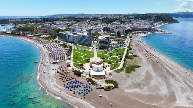 Aerial drone cinematic video of Rodos  or Rhodes island town Elli beach and peninsula a popular summer tourist destination, Dodecanese, Aegean, Greece