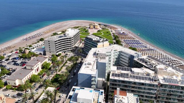 Aerial drone cinematic video of Rodos  or Rhodes island town Elli beach and peninsula a popular summer tourist destination, Dodecanese, Aegean, Greece