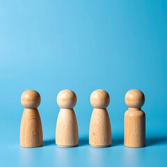 Wooden figures in a line