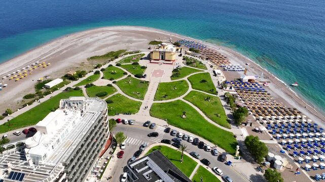 Aerial drone cinematic video of Rodos  or Rhodes island town Elli beach and peninsula a popular summer tourist destination, Dodecanese, Aegean, Greece