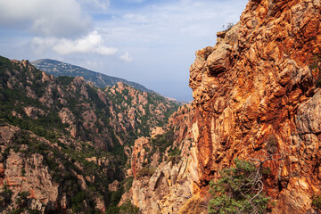 Mountain landscape of Calanques de Piana, Corsica, France. Rough red rocks