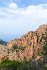Naklejka premium Coastal rocky mountains of Calanques de Piana, Corsica, France. Vertical landscape