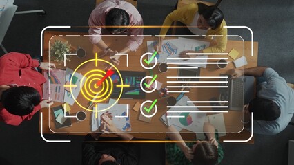 Collaborative brainstorming session in a modern workspace featuring charts, graphs, and creative teamwork for business strategy and planning Gluon.