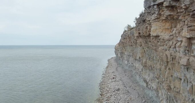 Aerial view of Panga cliff in cloudy spring weather, Saaremaa, Estonia.