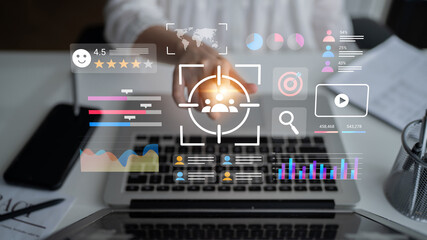A detailed view of a laptop with a digital interface showcasing data visualization, user analytics, and feedback mechanisms for effective business strategy enhancement. Gantry