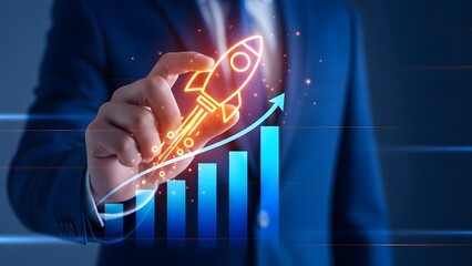 Business growth concept with rocket ship and bar graph