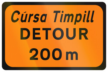 Temporary warning road sign used in Ireland - Detour 200 metres ahead in Gaelic and English