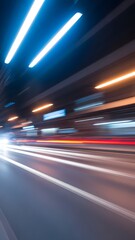 Fototapeta premium Blurry highway tunnel with neon lights and motion