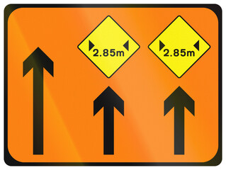 Temporary warning road sign used in Ireland - Lanes 2 and 3 of 3 Narrow ahead