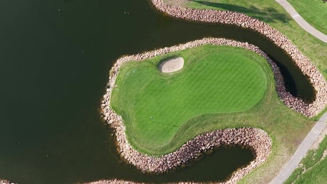 The Ultimate Retirement Dream: Cinematic Aerial Flyover of Salgados Golf Course Nestled Between the Atlantic Ocean and Natural Lagoons in Algarve, Portugal