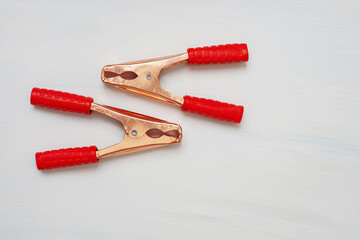 Clamp copper- white background.  Use to connect the cable and the metal case of the equipment- photo clipart