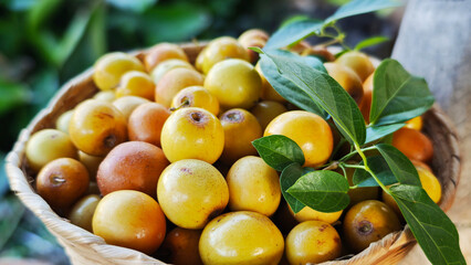 Sweet and sour jujubes in a basket.