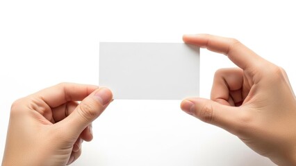 Fototapeta premium Hands holding a blank business card isolated on white background