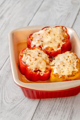 Colorful bell peppers baked with bolognese sauce and golden melted mozzarella topping