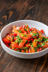 Mediterranean roasted red pepper medley with olive oil and fresh herbs