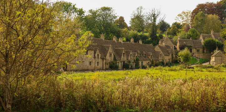 Arlington Row, Bibury, Cotswolds featuring historic limestone cottages nestled within a picturesque English village landscape