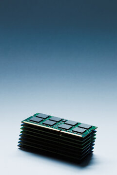 Stacked laptop ddr memory modules on grey background