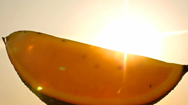 A slice of bright yellow melon rests against a vivid sunset background, showcasing its vibrant color. The melon slice highlights the refreshing essence of summer fruits in nature.