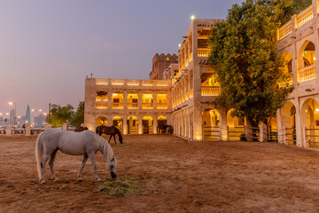 Evening view of Horse stables at Souq Waqif market in Doha, Qatar