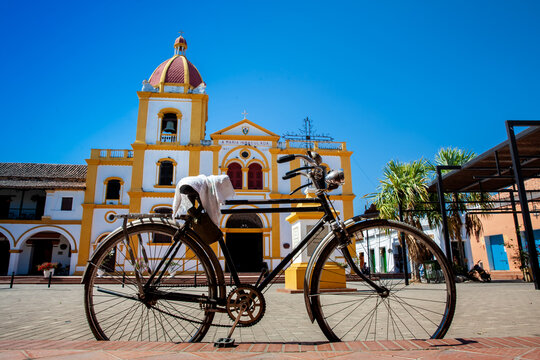 Bicycle and the Historical Church of the Immaculate Conception built in 1843 in the beautiful Heritage Town of Mompox in Colombia