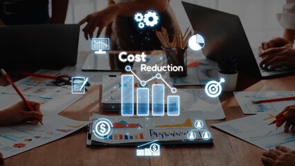 A dynamic business meeting focused on cost reduction strategies featuring data analysis, financial charts, and collaborative teamwork in a modern office setting. Raster