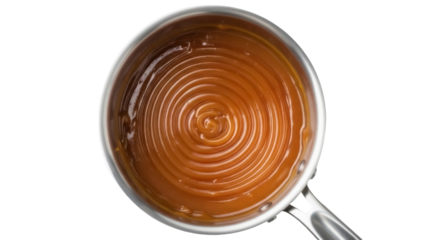 Caramel sauce in a stainless steel pot isolated PNG, sweet dessert topping for baking and confectionery on transparent background
