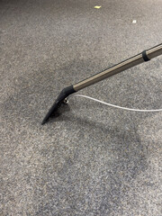 Industrial carpet cleaning machine wand extracting dirt