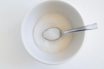 A generous heap of white crystalline monosodium glutamate, a popular flavor enhancer