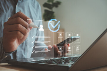 Businessman using digital checklist virtual interface for recruitment process, candidate screening, HR management, employee verification, online assessment, modern human resource technology concept.