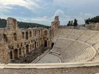 Ancient Odeon of Herodes Atticus Amphitheater Ruins With Tiered Stone Seats And Arched Walls, Athens Greece