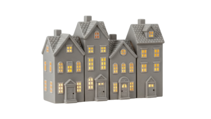 Charming ceramic Christmas village houses isolated PNG, festive holiday decor with glowing windows on transparent background