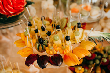 Fresh fruit skewers presenting healthy catering appetizers