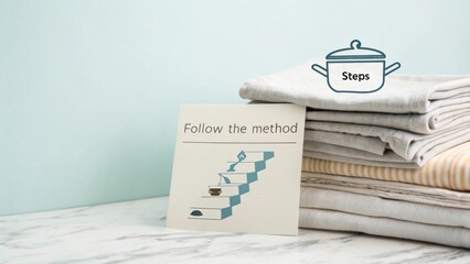 Folded Linen Next to Stacked Recipe Cards Creating a Visual Guide