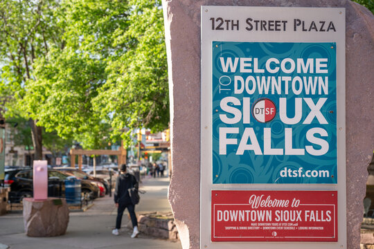 Sioux Falls, South Dakota, USA - 5.15.2025: Street sign in at the front of historic old Downtown.