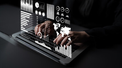 A person engages in data analysis on a laptop, surrounded by interactive graphs and charts, symbolizing essential business insights and modern technology integration. Impute