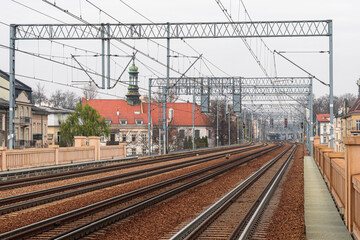 A four-track railway line running from Krak&oacute;w Grzeg&oacute;rzki station toward Krak&oacute;w Gł&oacute;wny station (visible in the background), passing through the historic center of Krak&oacute;w.