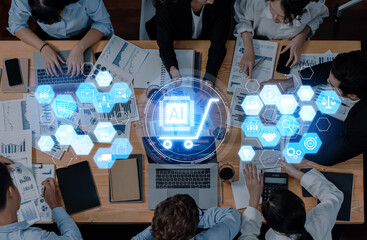 Aerial view of business professionals discussing digital commerce strategies, integrating artificial intelligence with data visualization and teamwork for innovative growth. Trope