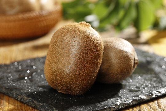 Fresh Kiwi Fruits on Dark Slate - Healthy Produce Photography
