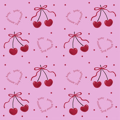 赤いリボンがついたハート型の真っ赤なサクランボとドットのロマンチックなパターン